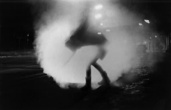 photo of a woman in the fog